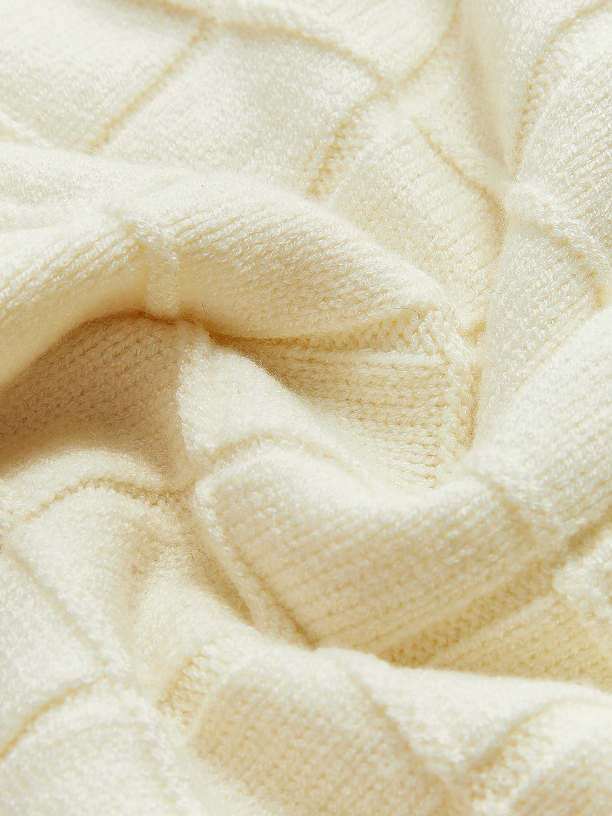 Sweter w kratę o kontrastowym kroju