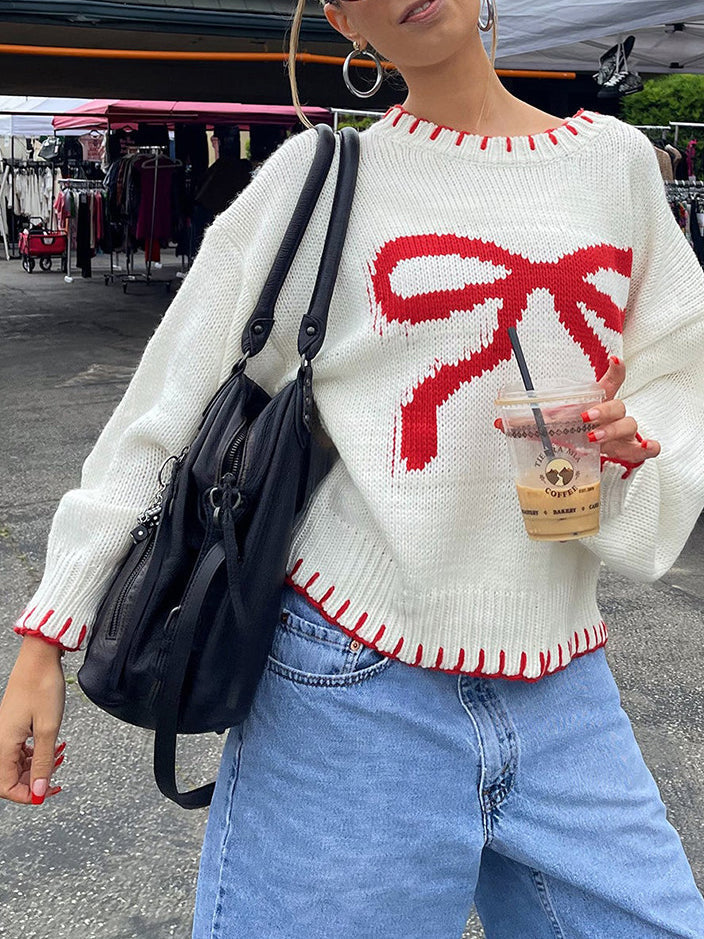 Sweter z kontrastową kokardą