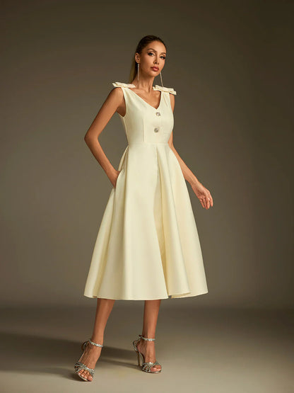 Sukienka midi Colette z satyny z rozkloszowaną nogawką 