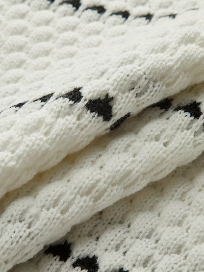 Kontrastujący sweter w paski