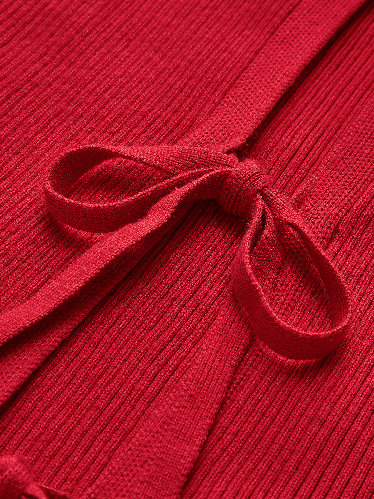 Dzianinowa kamizelka z prążkowanym kołnierzykiem i wiązaniem