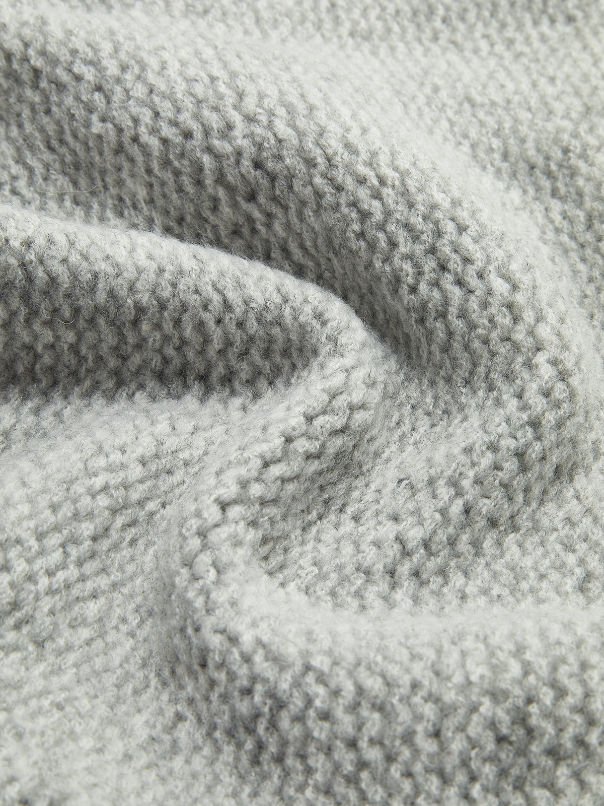 Dzianinowa bluzka z kokardą z przodu