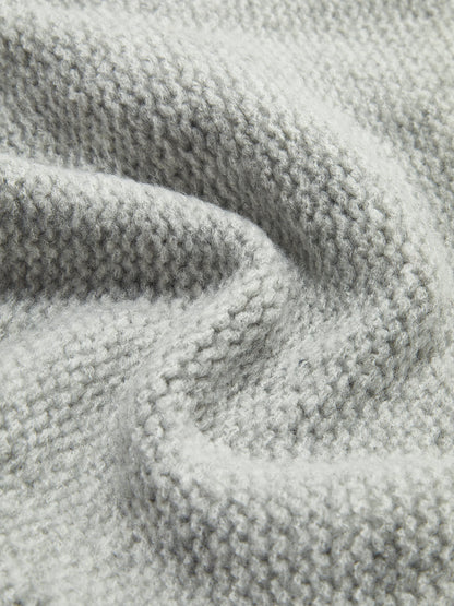 Dzianinowa bluzka z kokardą z przodu