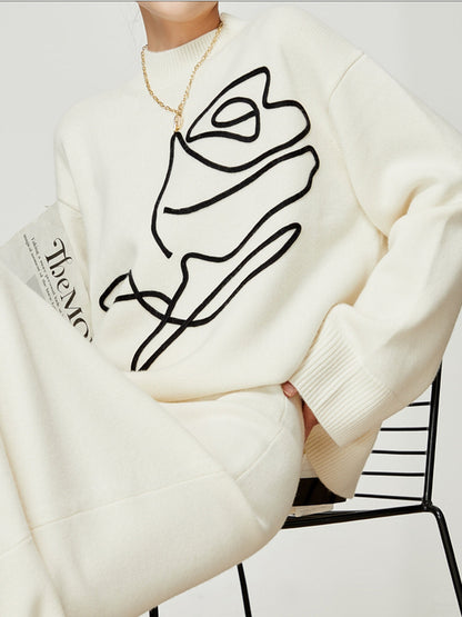 Sweter z dzianiny w kwiaty