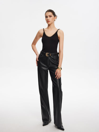 Top z dzianiny na cienkich ramiączkach, przeszyty metalowymi ściegami