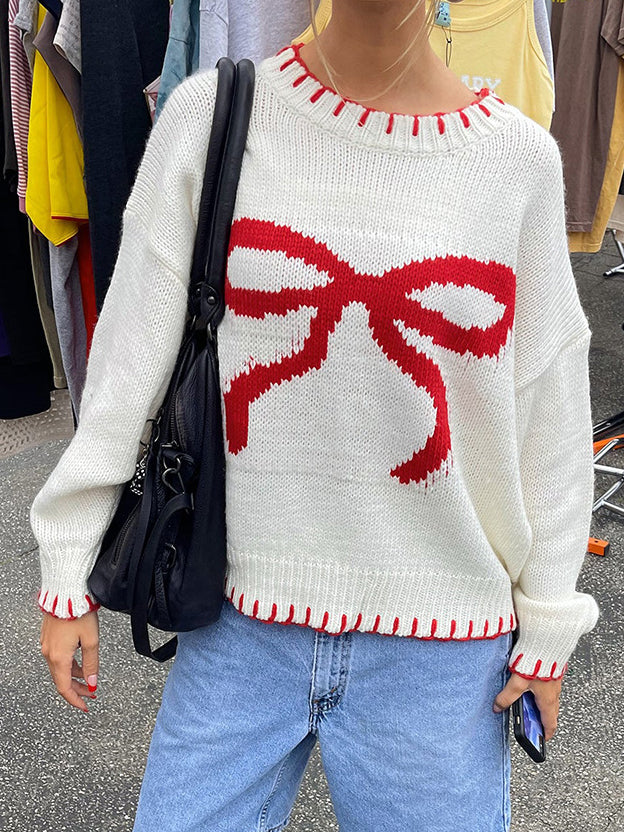 Sweter z kontrastową kokardą