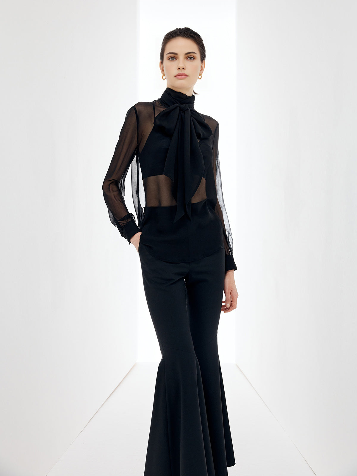 Przezroczysta bluzka z szyfonu z kokardą