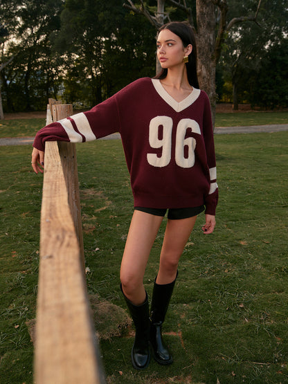 Sweter z kontrastowym wiązaniem i dekoltem w serek