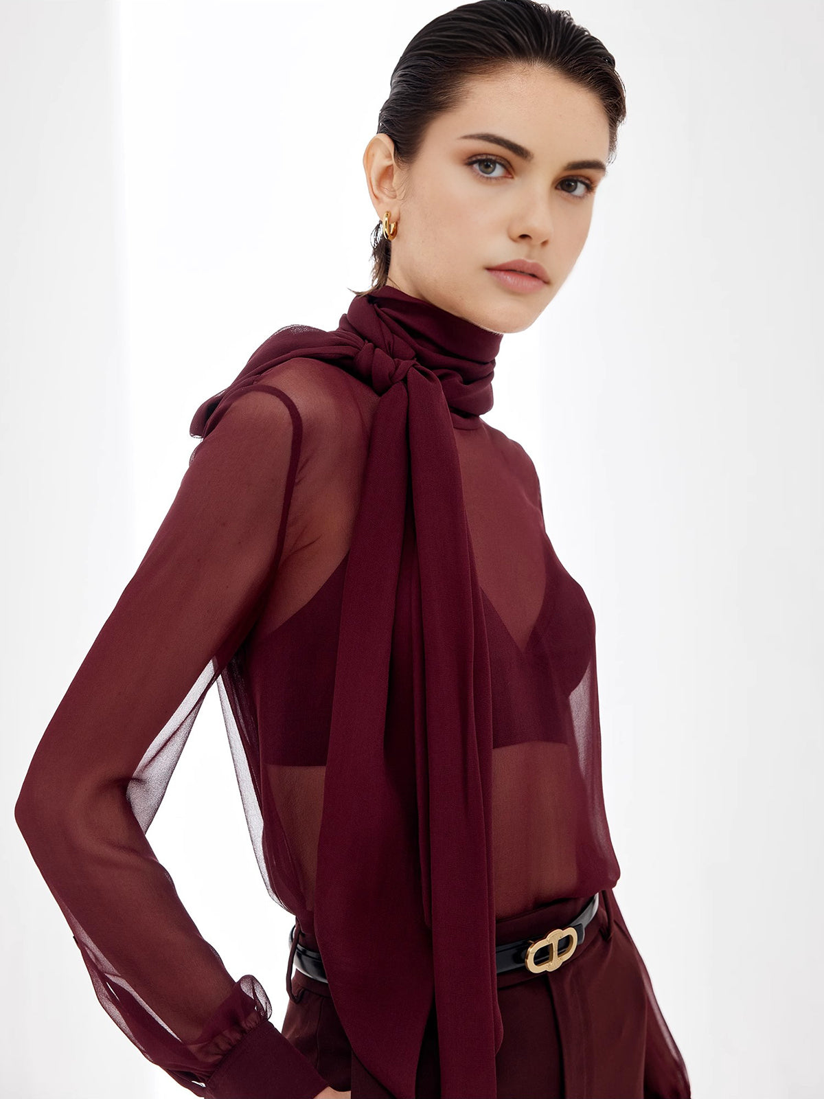 Przezroczysta bluzka z szyfonu z kokardą