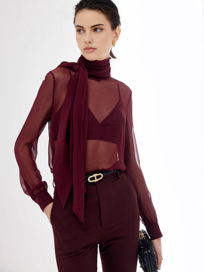 Przezroczysta bluzka z szyfonu z kokardą