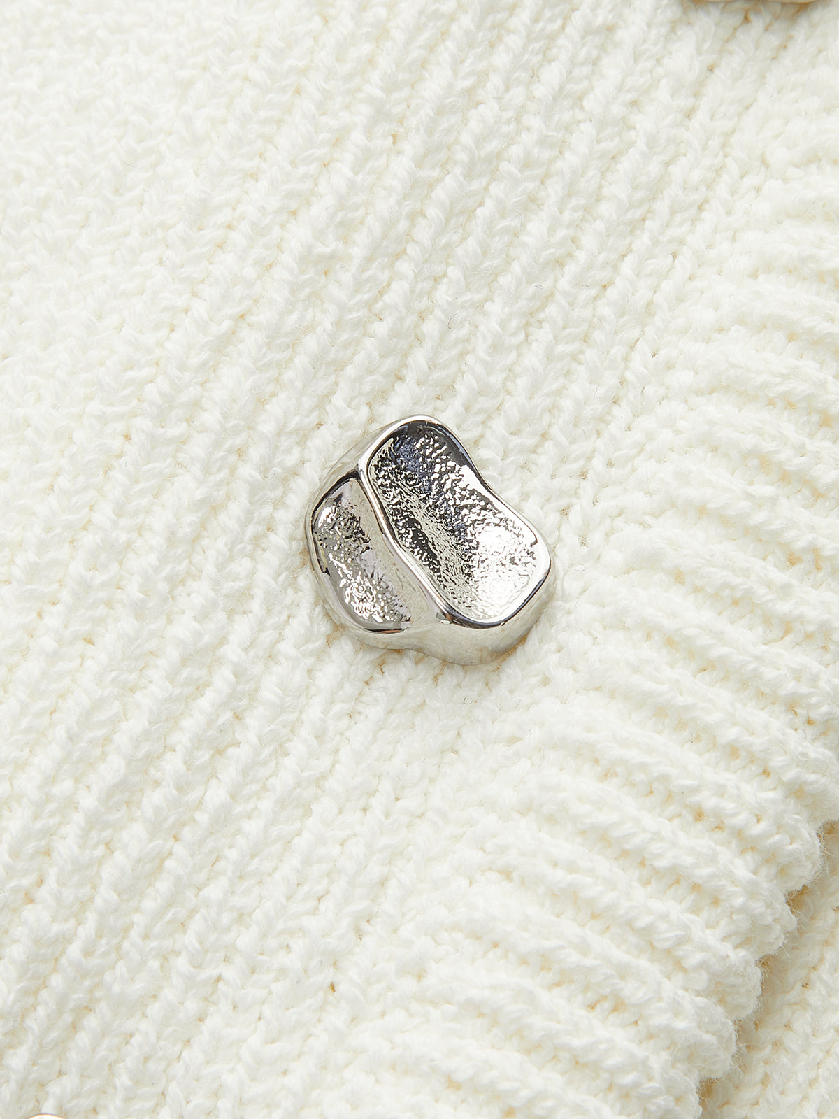 Sweter-kamizelka zapinany z przodu na guziki