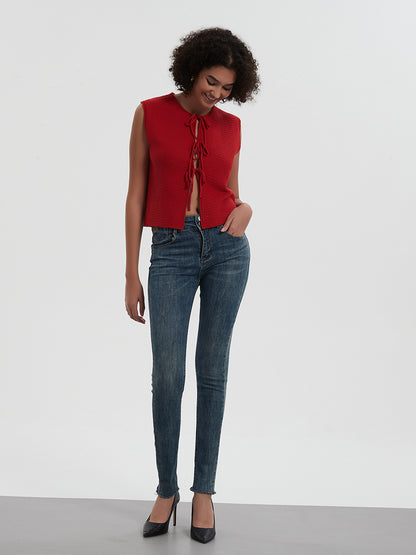 Dzianinowa kamizelka z prążkowanym kołnierzykiem i wiązaniem