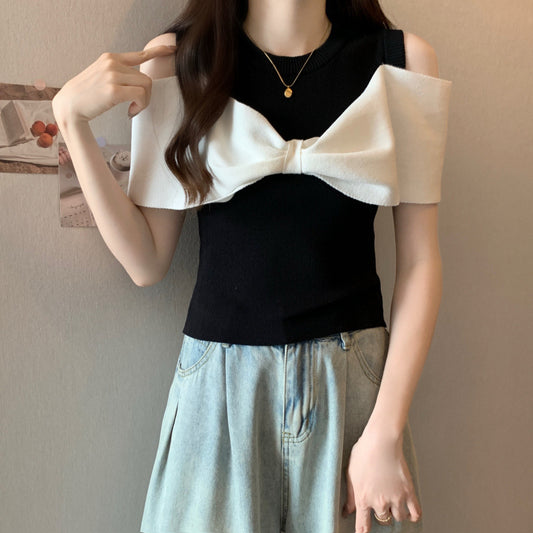 Rozciągliwy sweter z kokardą