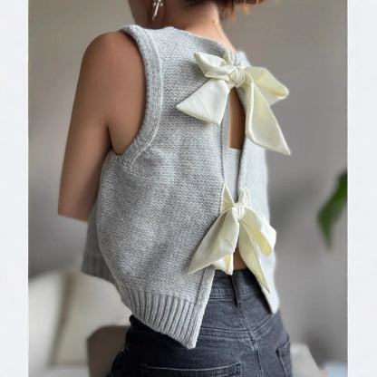 Dzianinowa bluzka z kokardą z przodu